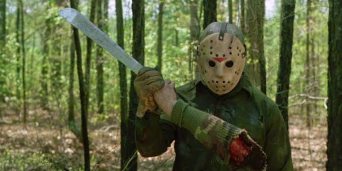 Jason holding a severed arm in Friday the 13th Part VI Jason Lives