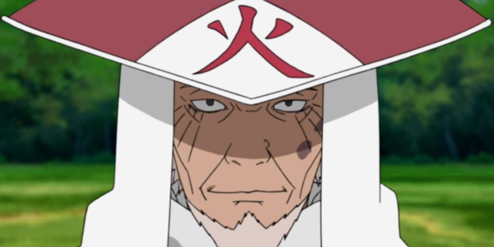 Hiruzen Sarutobi, Third Hokage, smiling in Hokage uniform