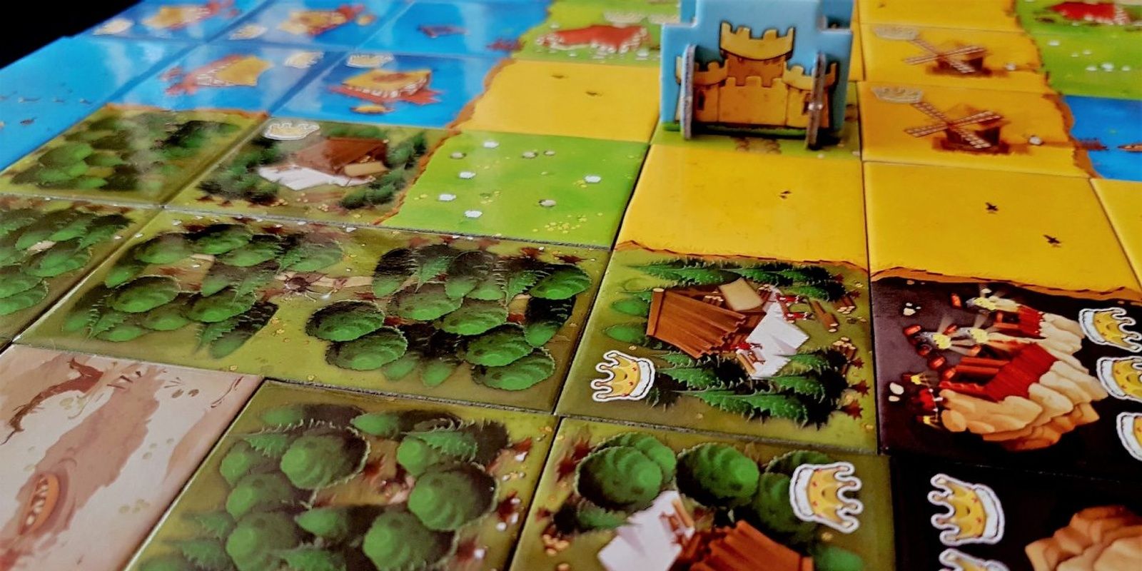 Kingdomino Board Game Being Played On Table