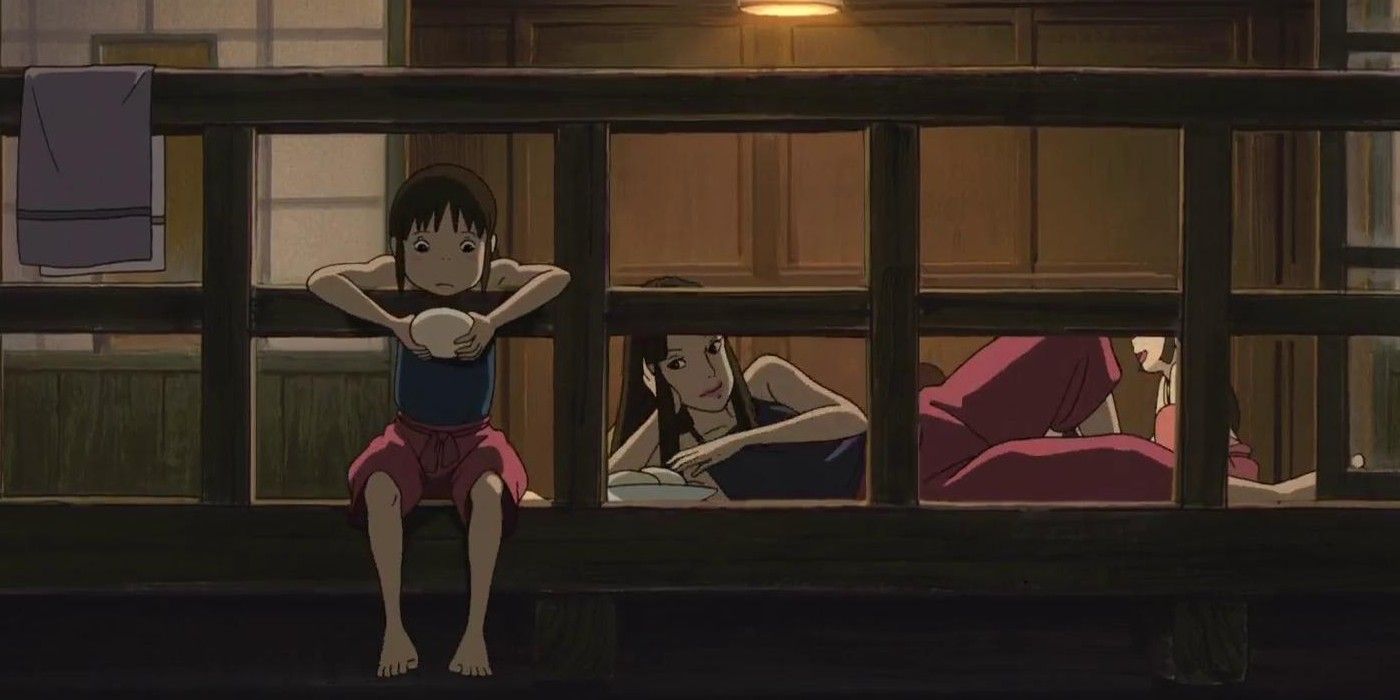 Spirited Away Lin and Chihiro sitting together after work in the bathhouse