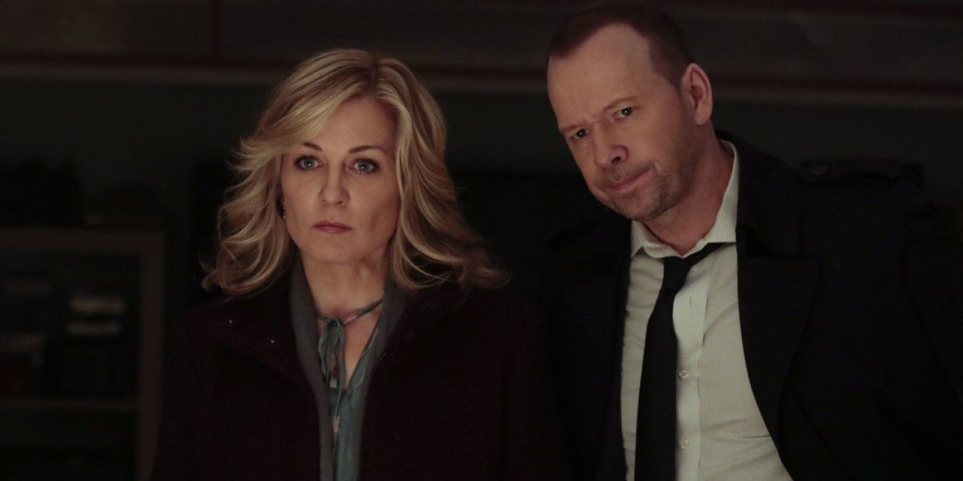 Linda Reagan and Danny Reagan stand side by side and look upset in Blue Bloods.