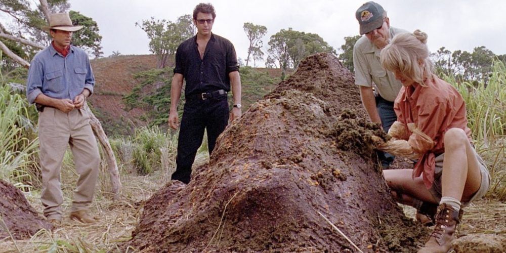 Dr. Grant, Dr. Satler and Dr. Malcolm inspect dinosaur droppings from Jurassic Park
