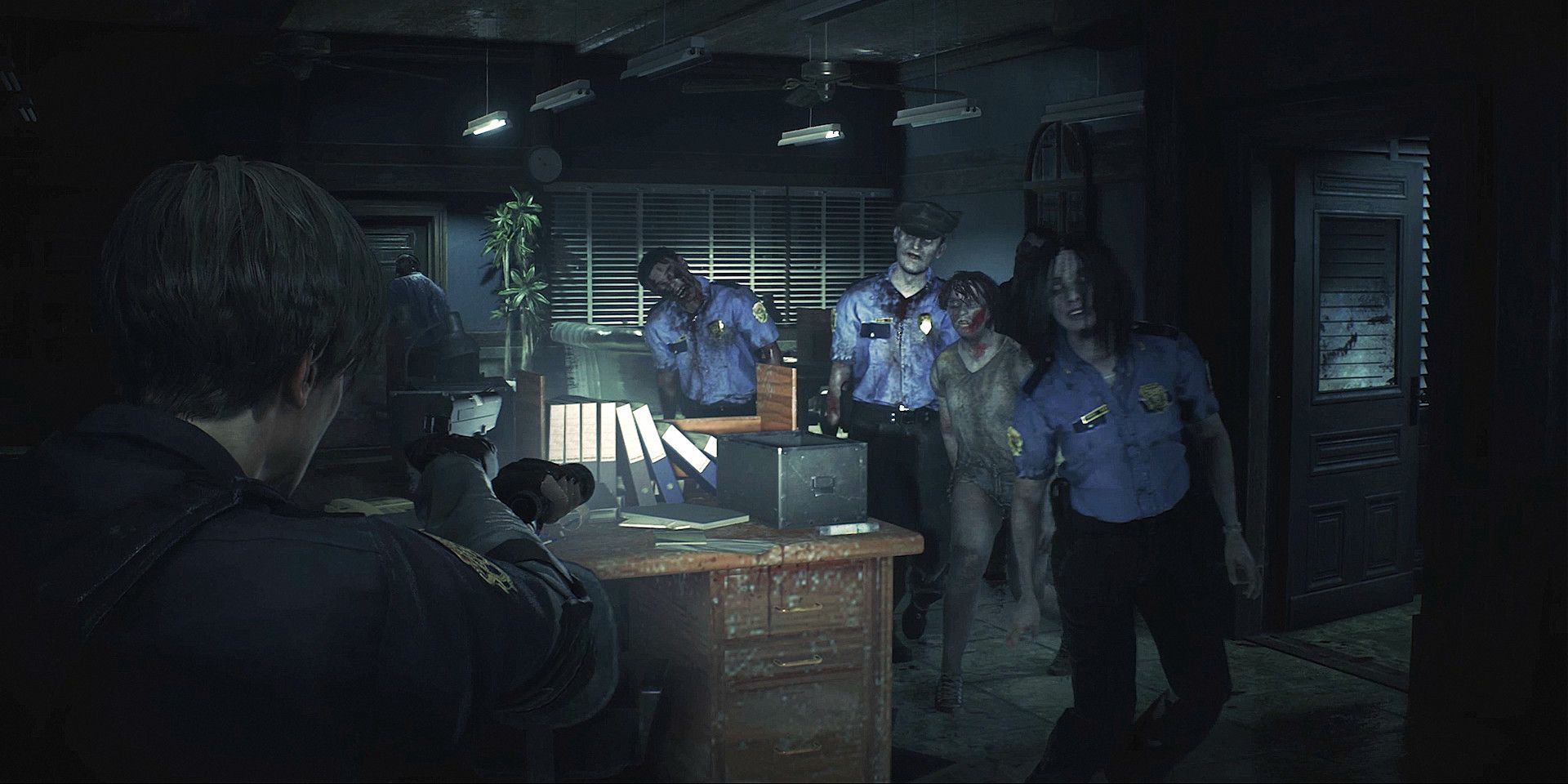 Leon Kennedy encountering zombies in Resident Evil 2 remake.