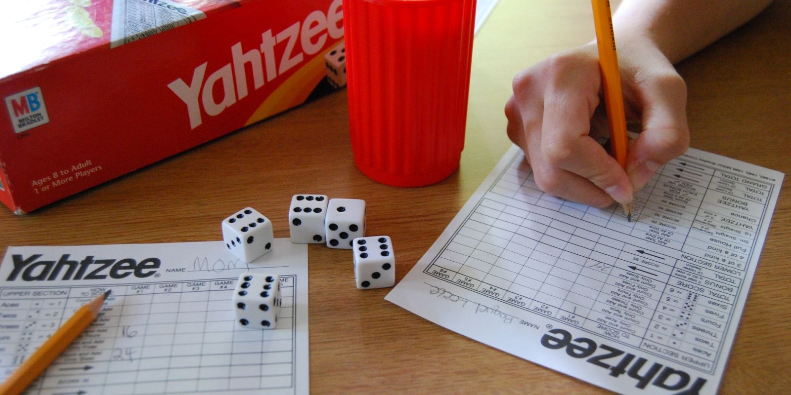 Yahtzee being played on a table