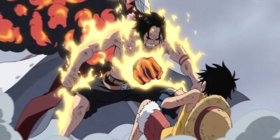 Ace being punched in the chest by Akainu in front of Luffy