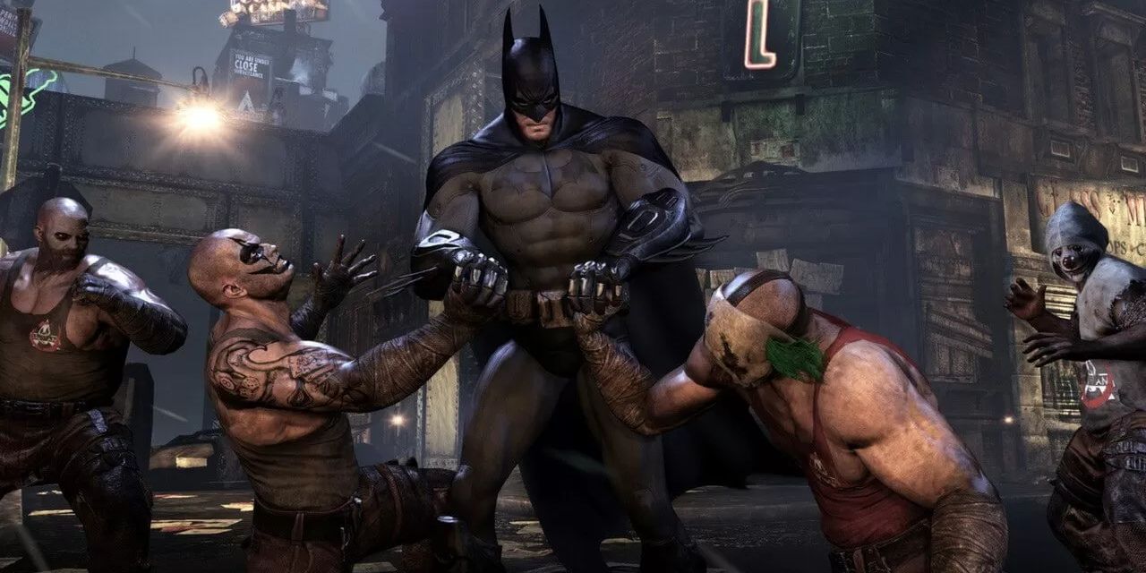 Batman fighting enemy grunts in Batman Arkham City