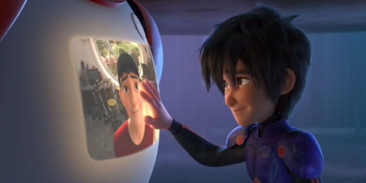 Hiro gazes at his brother Tadashi's image in Disney's Big Hero 6