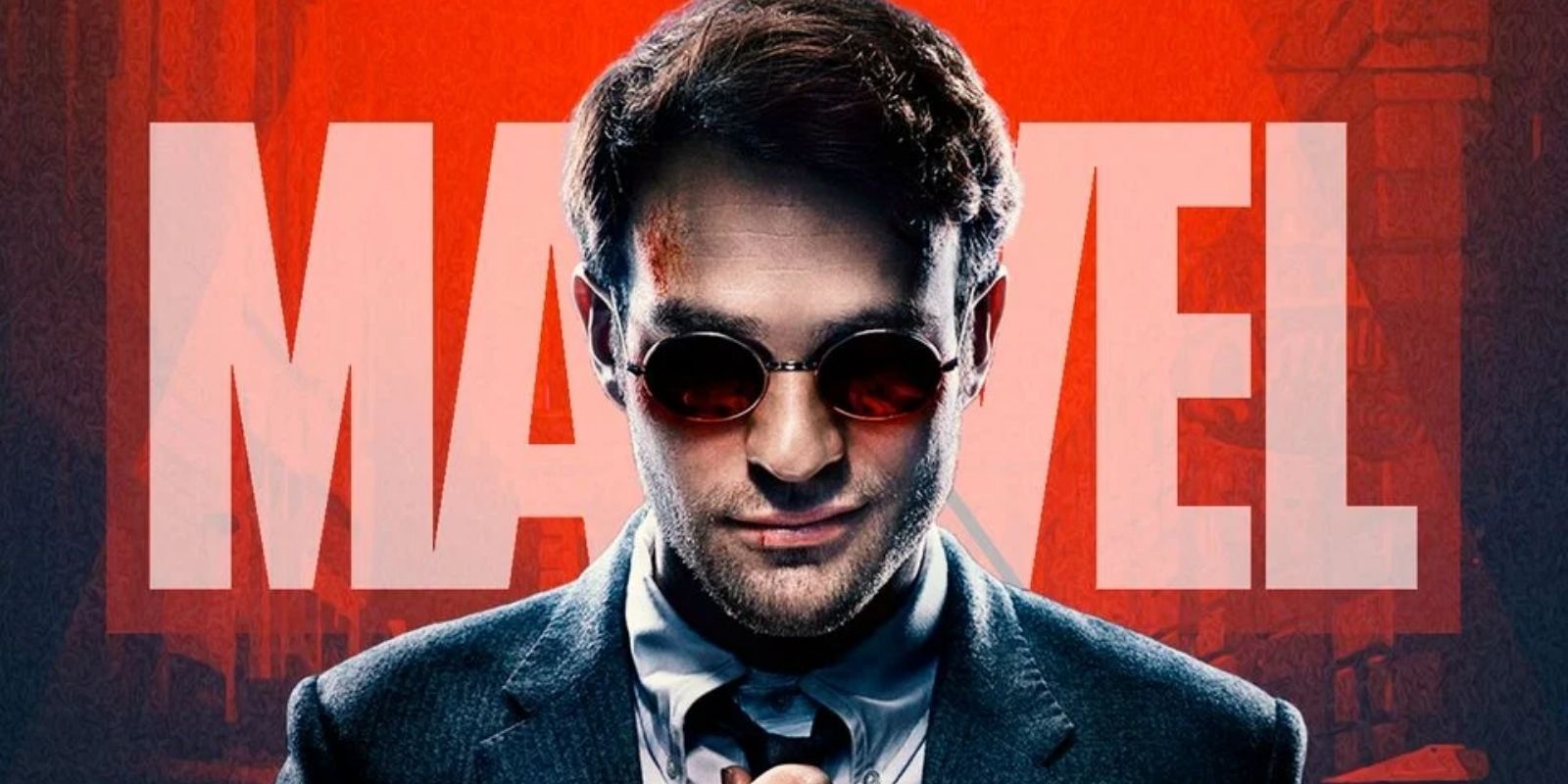 Charlie Cox's Daredevil stands in front of the Marvel logo