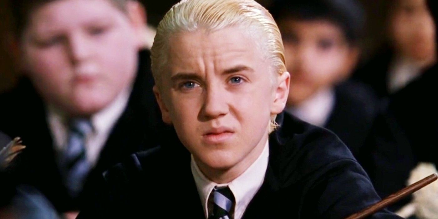 Draco Malfoy frowns in class in Harry Potter.