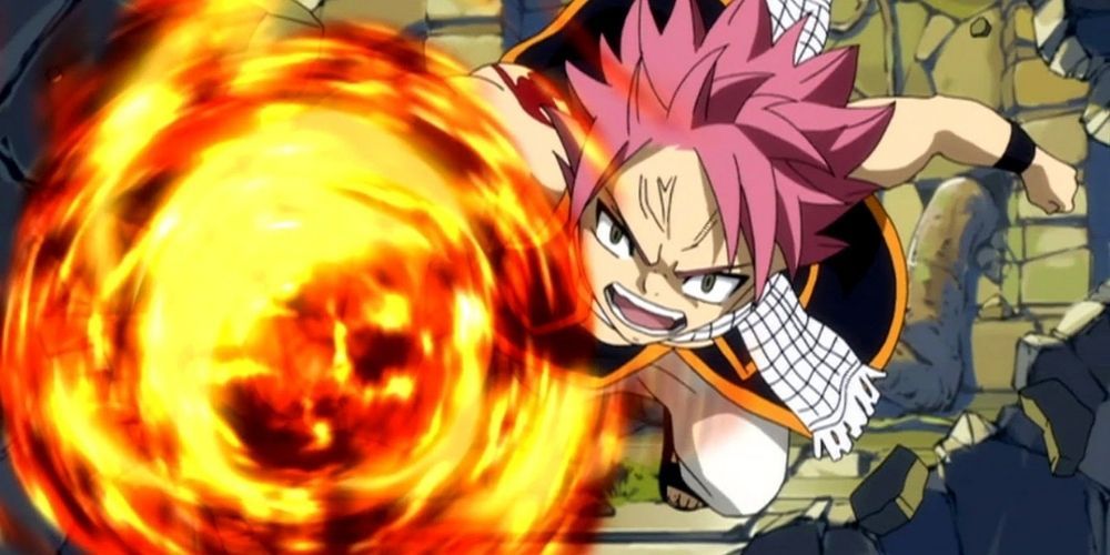 Dragon Slayer Natsu using fire magic to bust down wall in Fairy Tail
