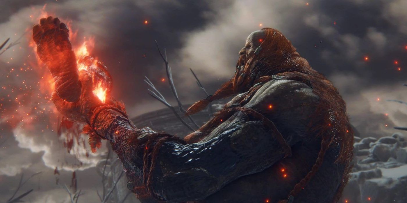 The Elden Ring Fire Giant offering his leg as a sacrifice.