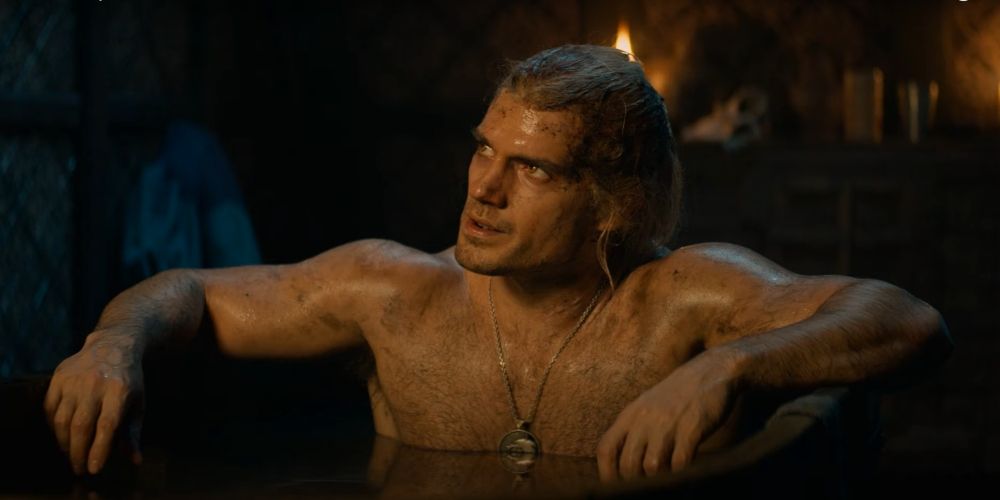 Jaskier gives Geralt a bath in the Witcher