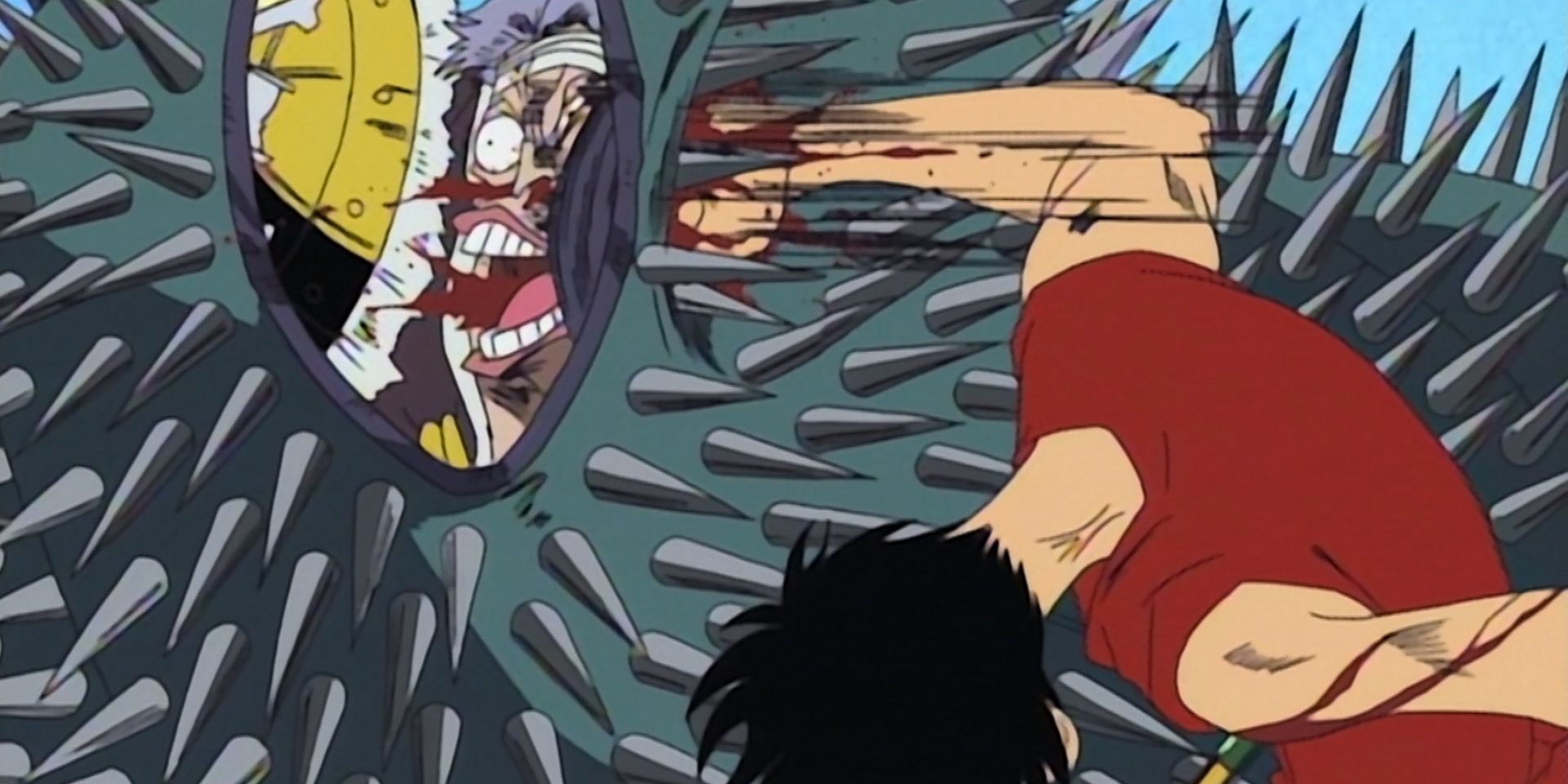 Luffy punches Don Krieg's spiked armor.