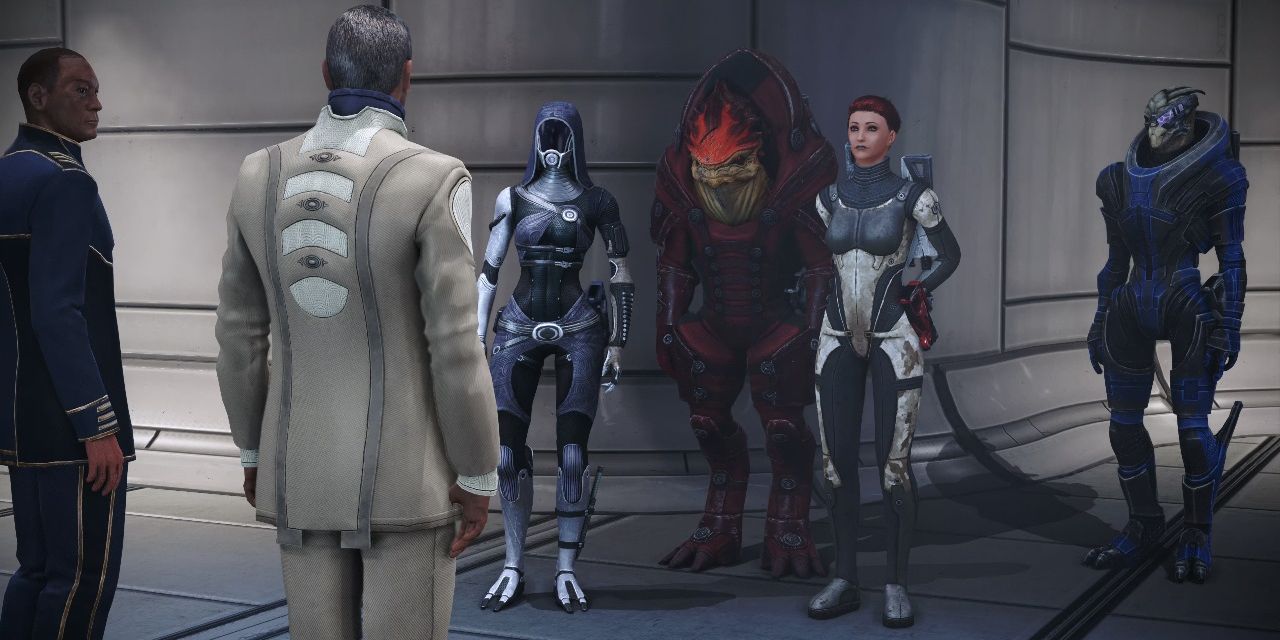 Tali, Wrex, Shepard, and Garrus converse with Captain Anderson and Ambassador Udina