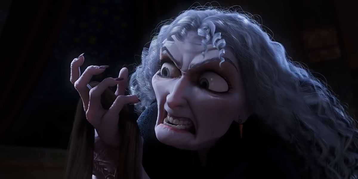 Mother Gothel notices her aging hand in Tangled