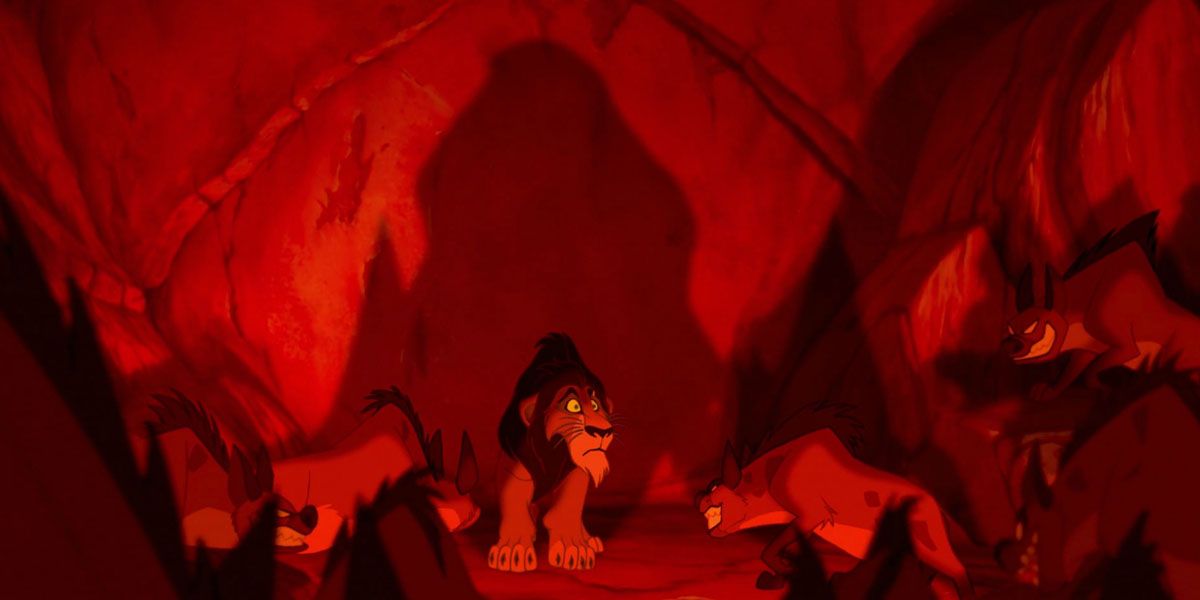 Scar surrounded by hyenas in The Lion King