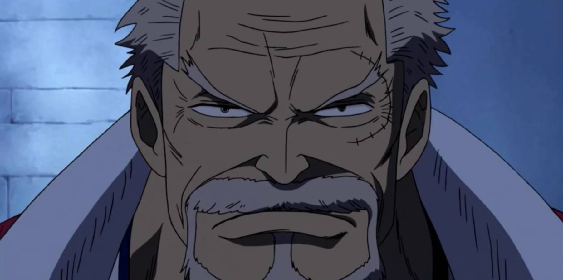 Garp speaking with Ace in prison in One Piece.