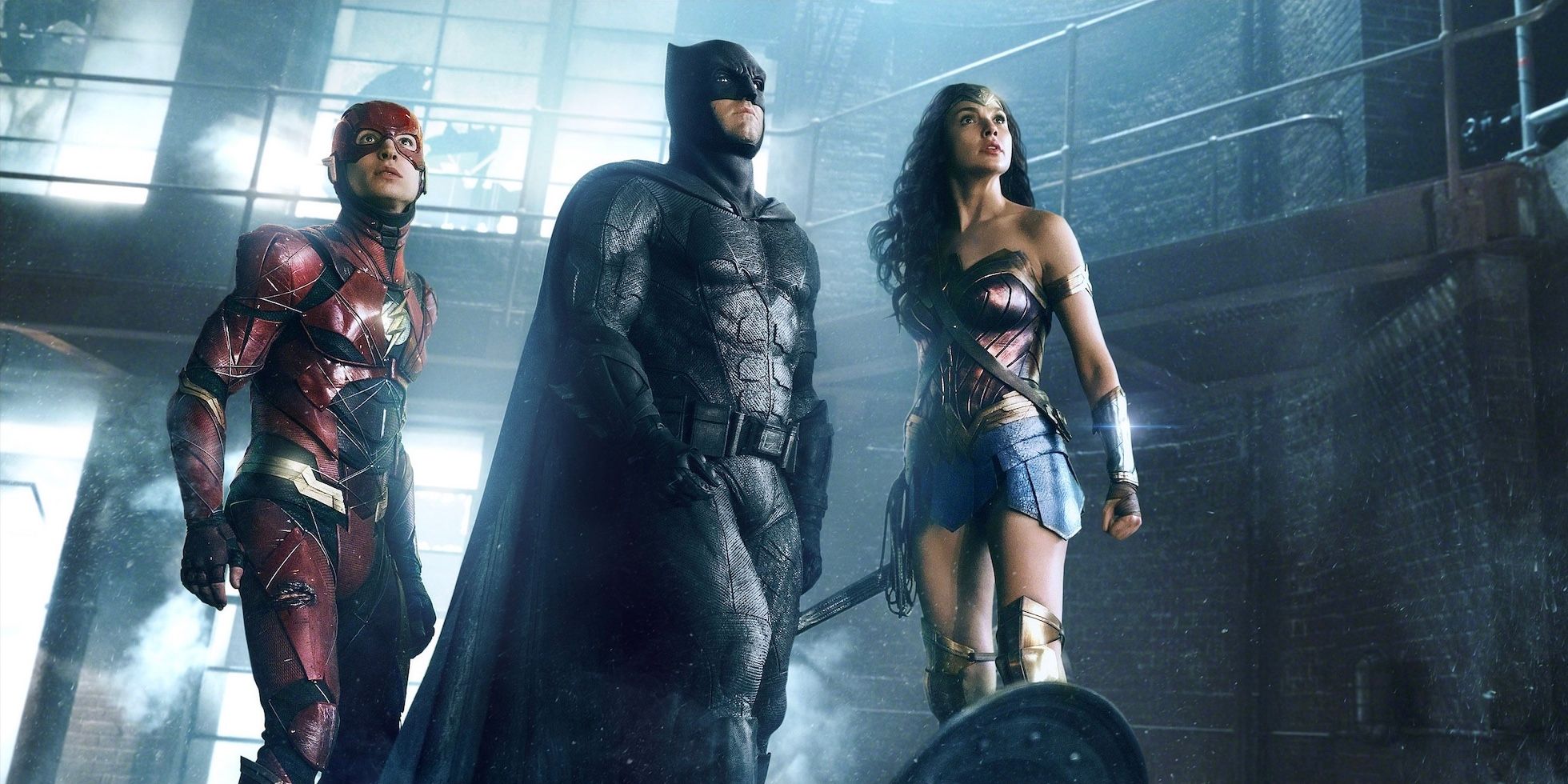 The Flash, Batman, and Wonder Woman standing together in Justice League