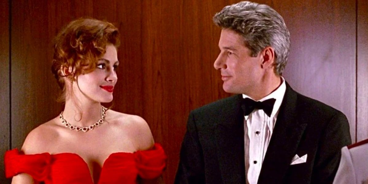 Richard Gere and Julia Roberts smile at one another in 1990's Pretty Woman