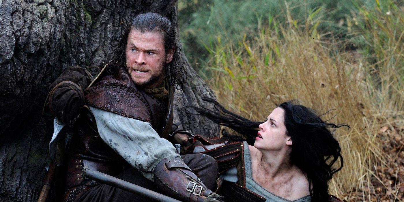 The Huntsman (Chris Hemsworth) saves Snow White (Kristen Stewart) in Snow White and the Huntsman