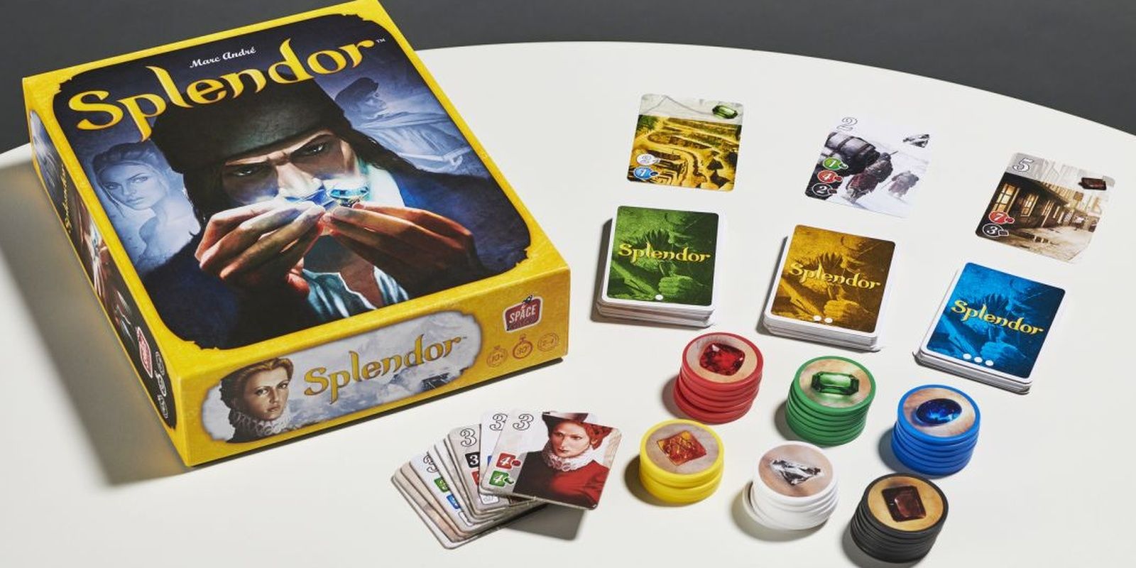 The box art and components of Splendor board game.