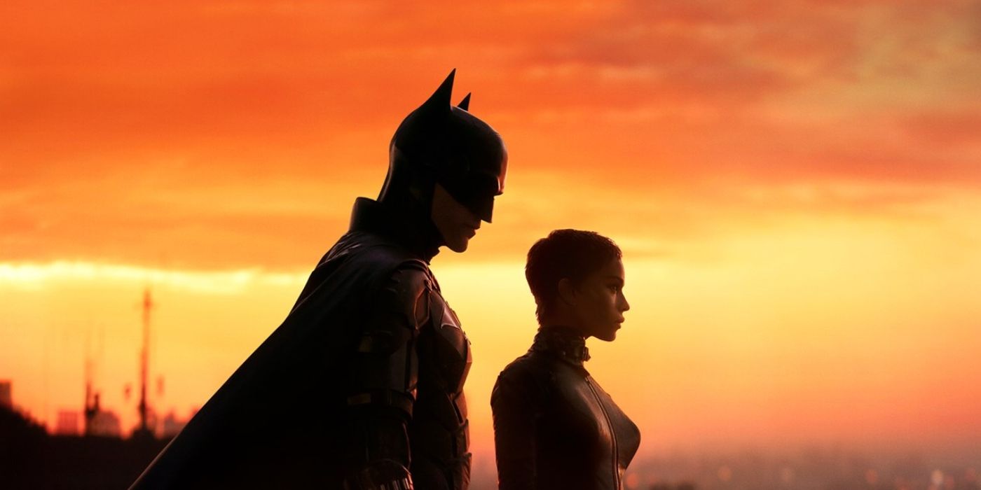 The Batman Header: Batman and Catwoman silhouetted on an orange sunset