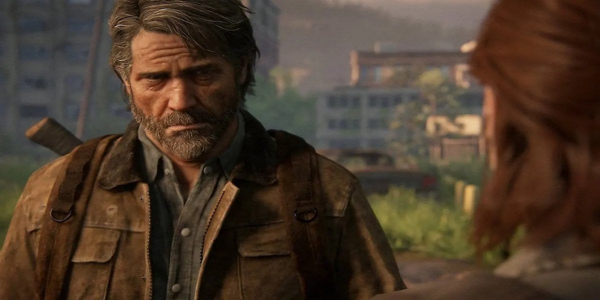 The Last of Us: Joel looks at Ellie with a saddened expression