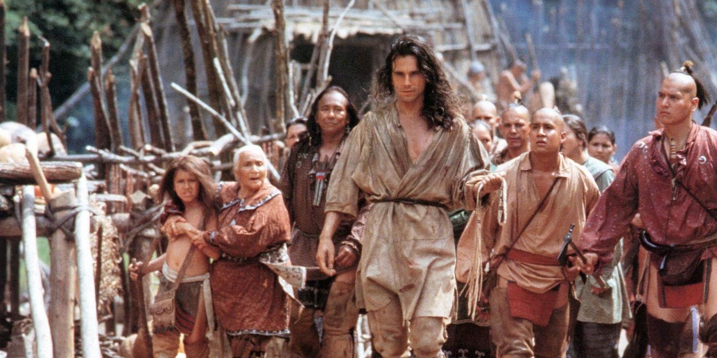 A group of villagers walking together in the movie The Last of the Mohicans
