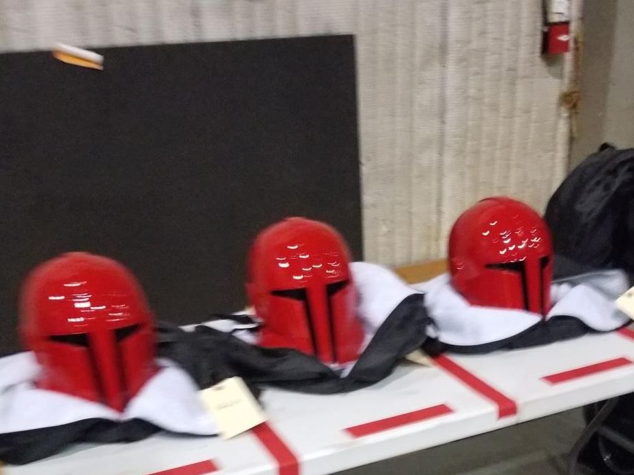 A set photo for The Mandalorian reveals red Mandalorian-like helmets.