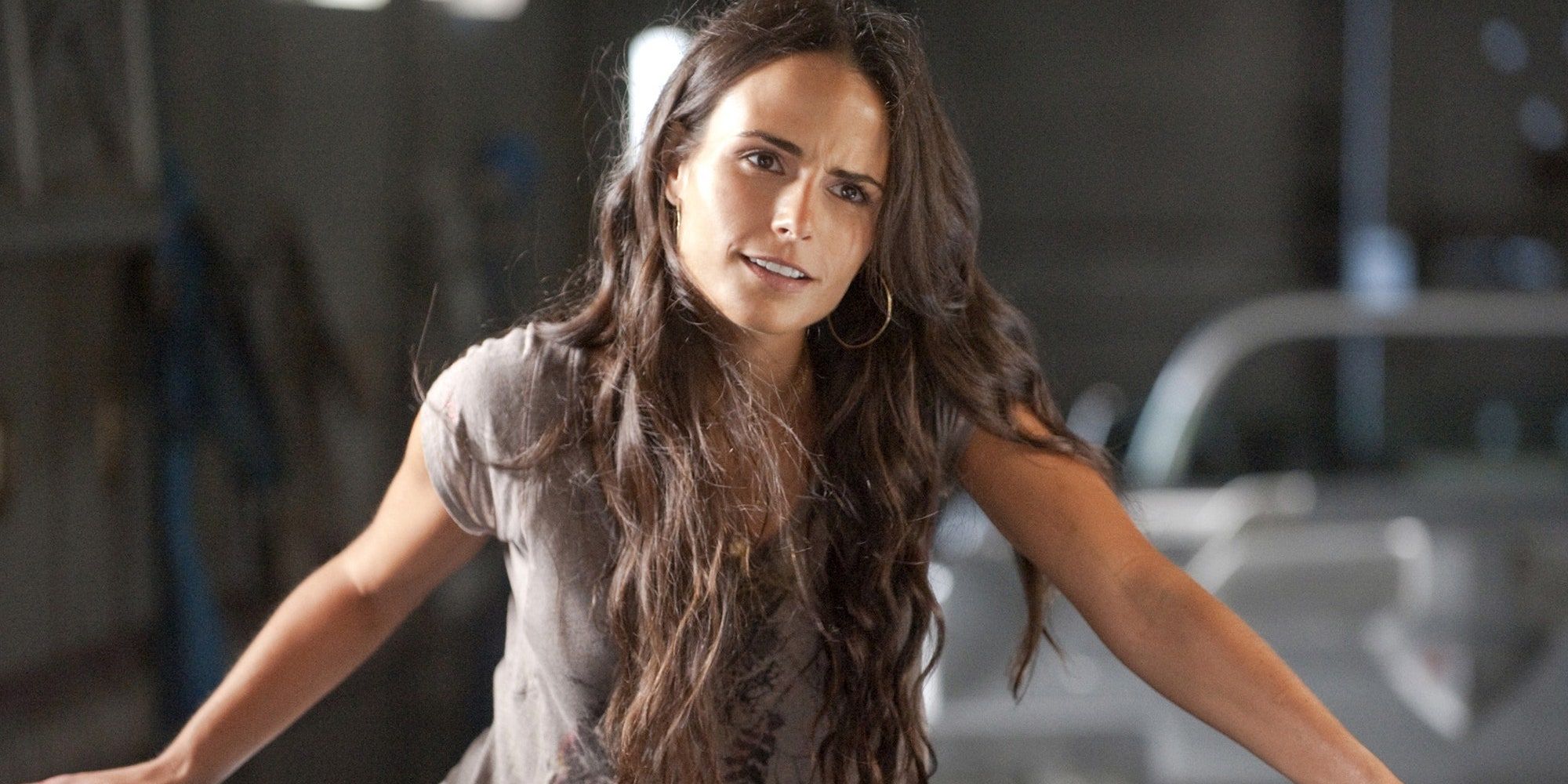 Mia Toretto (Jordana Brewster) with furrowed brow in The Fast and the Furious.