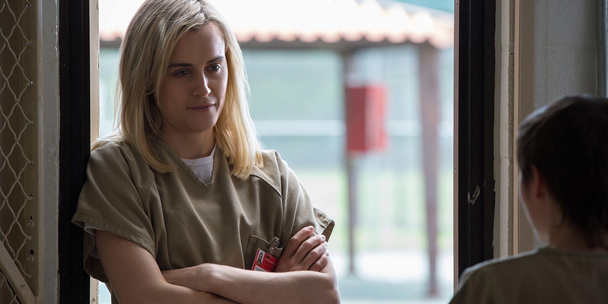Piper Chapman with her arms crossed in Orange is the New Black.