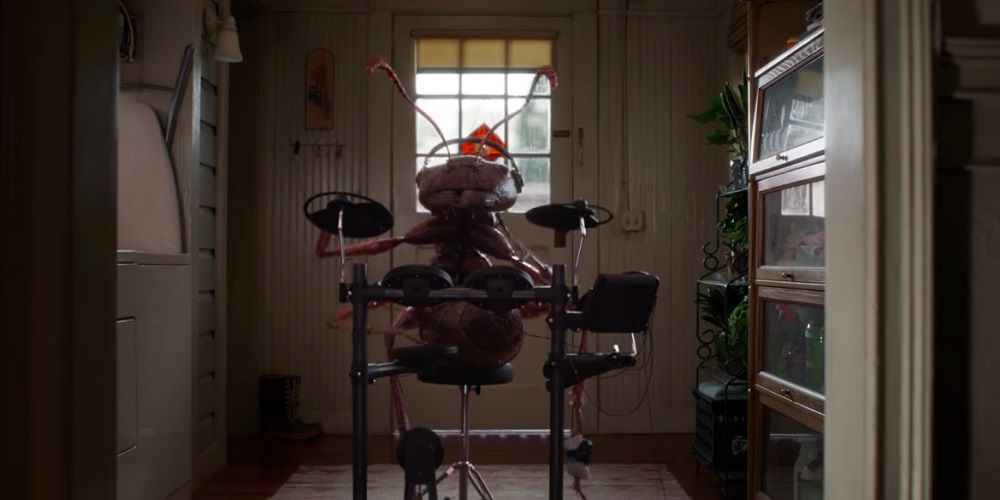 A giant ant playing drums in Ant-Man