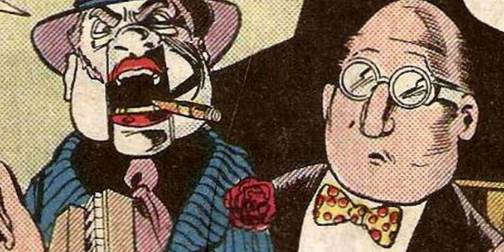  A timid Ventriloquist holding an angry Scarface in DC Comics