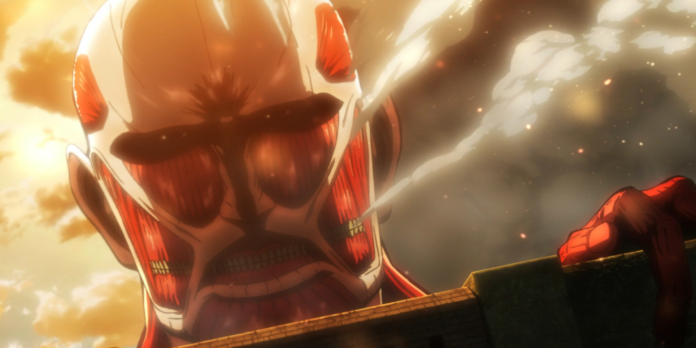 Bertholdt's Colossal Titan destroys the gate to Shiganshina in Attack on Titan.