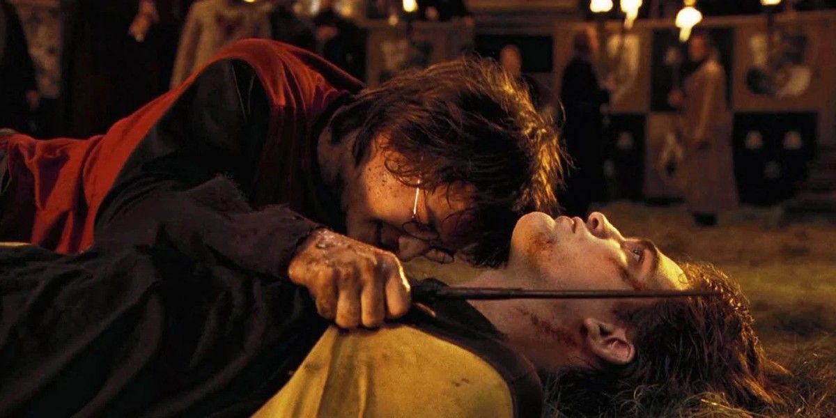 Harry Potter crying over Cedric Diggory's body in Harry Potter and the Goblet of Fire.