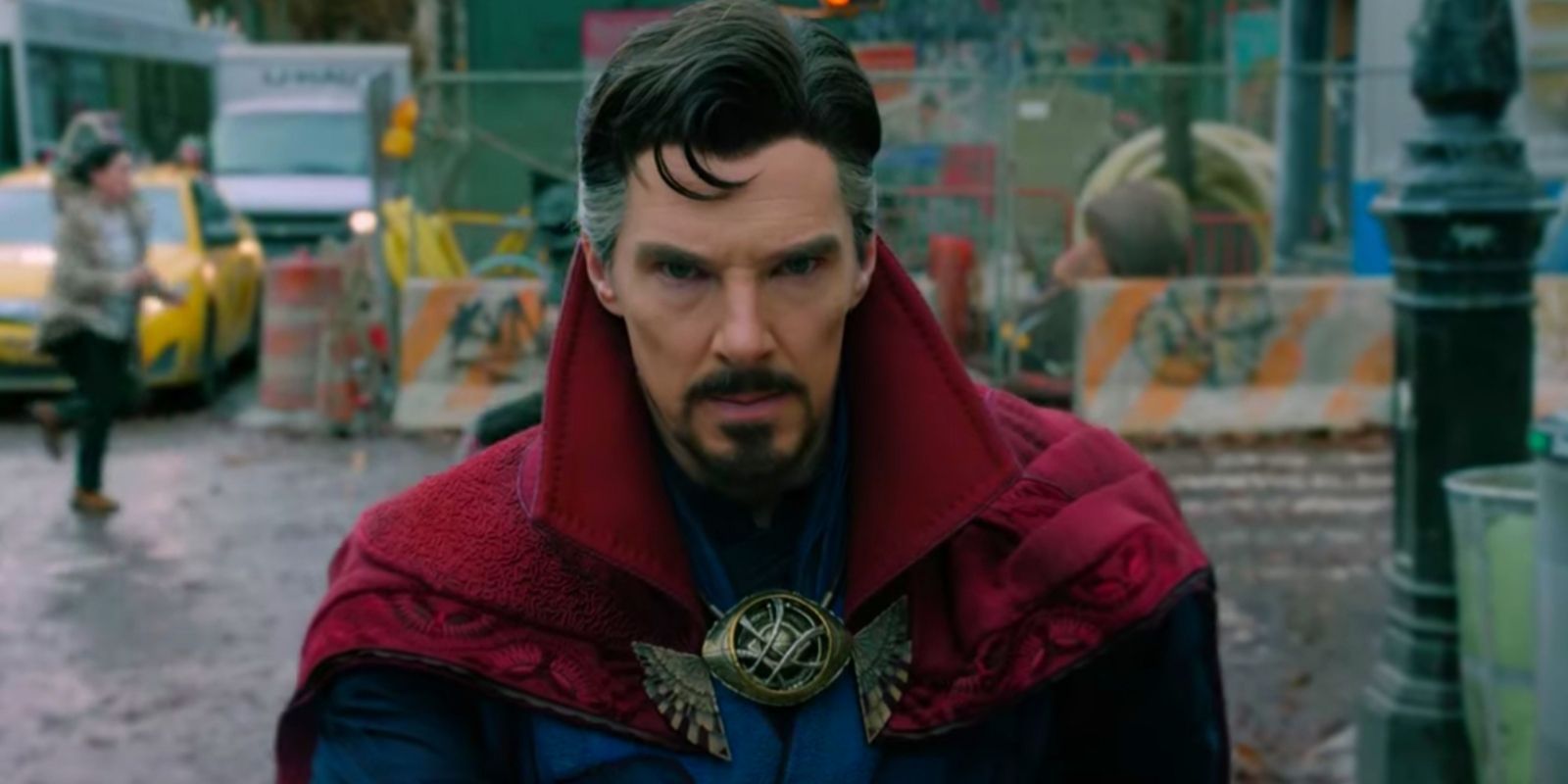 Doctor Strange in the Multiverse of Madness centered against a background of a city street.