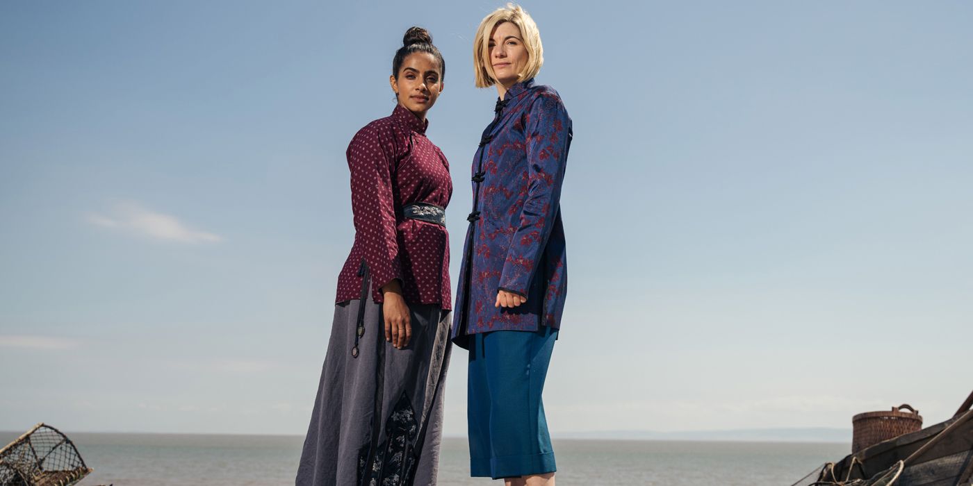 The Thirteenth Doctor and Yasmin Khan stand together on a beach on Doctor Who Legend of the Sea Devils