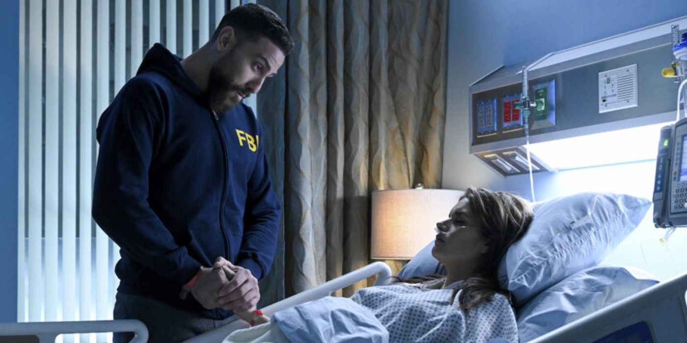 Maggie (Missy Peregrym) in hospital bed with OA (Zeeko Zaki) holding her hand on FBI