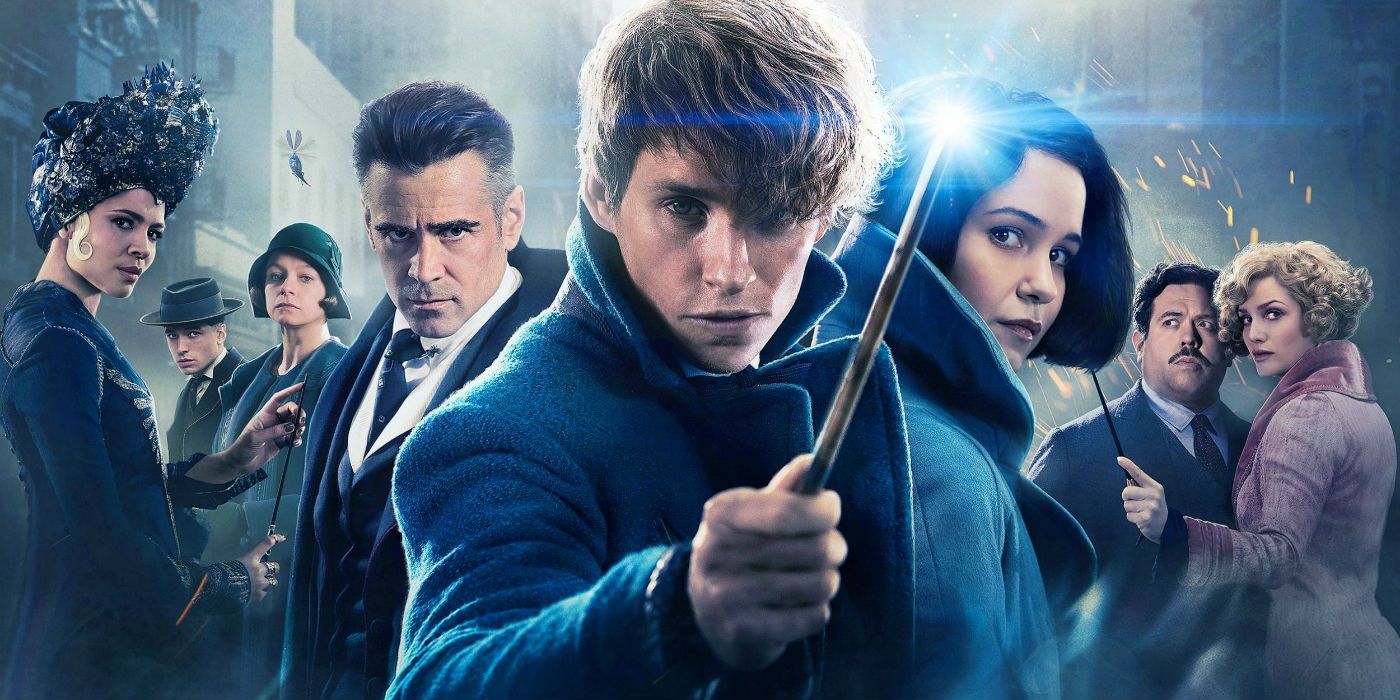 A Fantastic Beasts and Where to Find Them poster with Newt Scamander in front of the cast waving a glowing wand.
