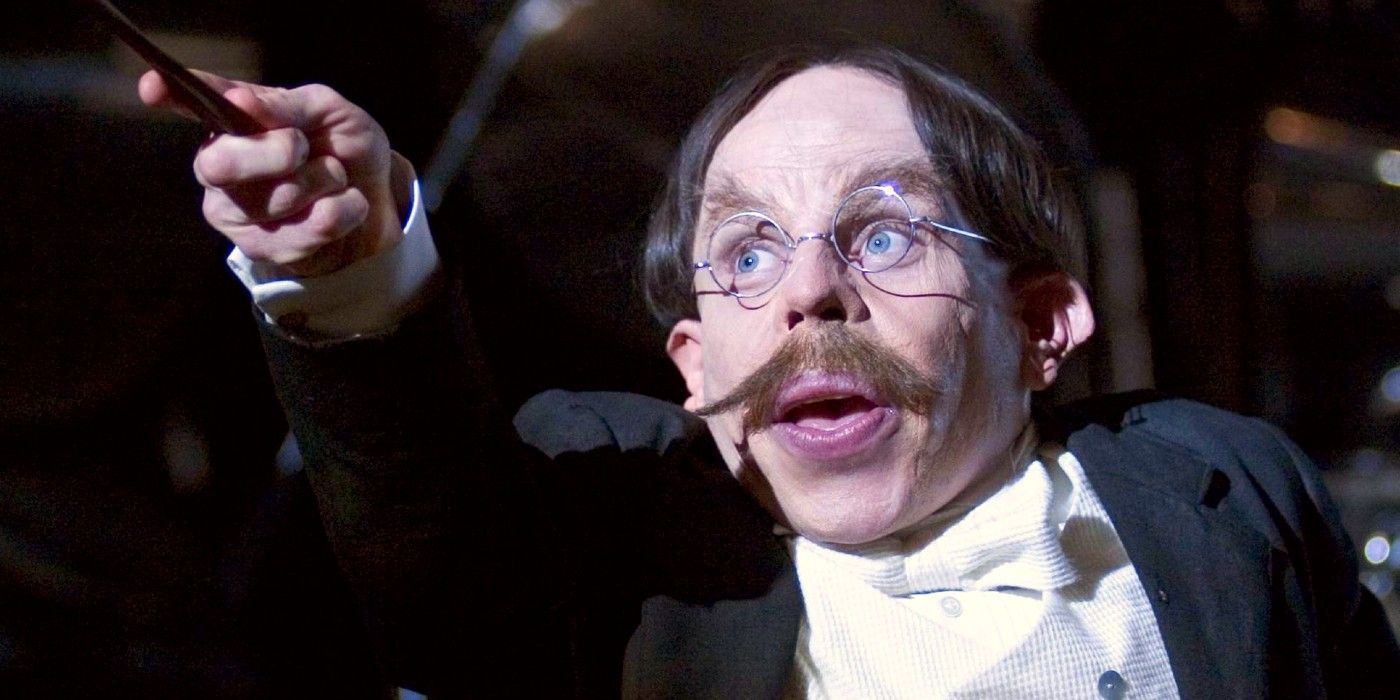 Filius Flitwick helping with protective enchantments in Harry Potter.