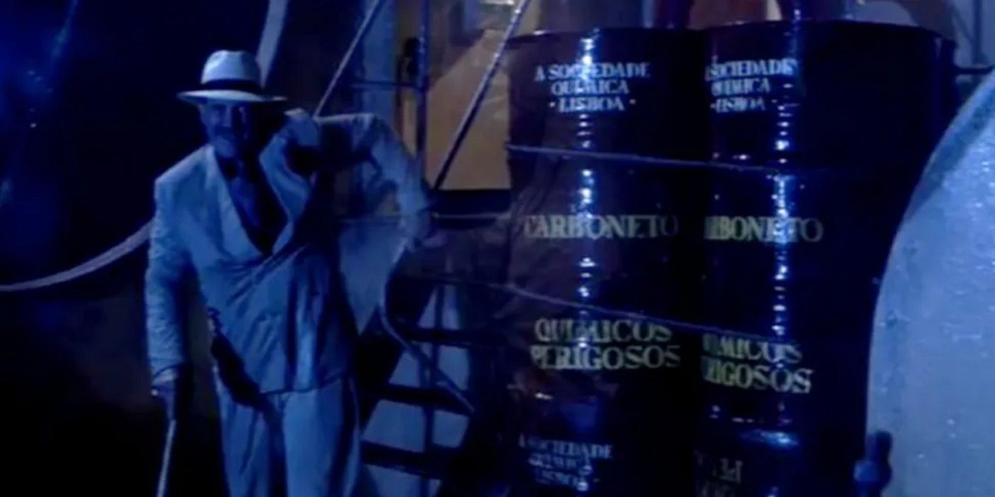 Sean Connery standing next to barrels of Carbonite in The Last Crusade