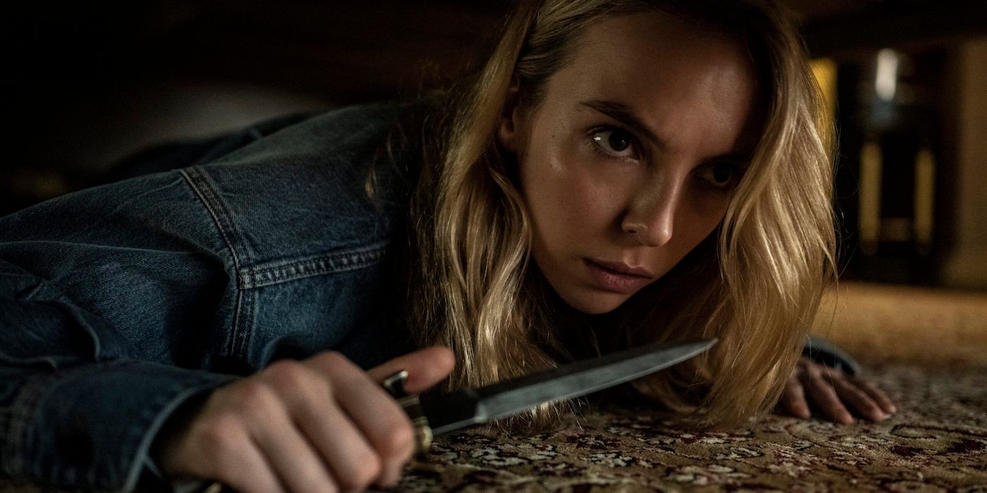 In Killing Eve, Villanelle (Jodie Comer) hides under a bed with a knife.