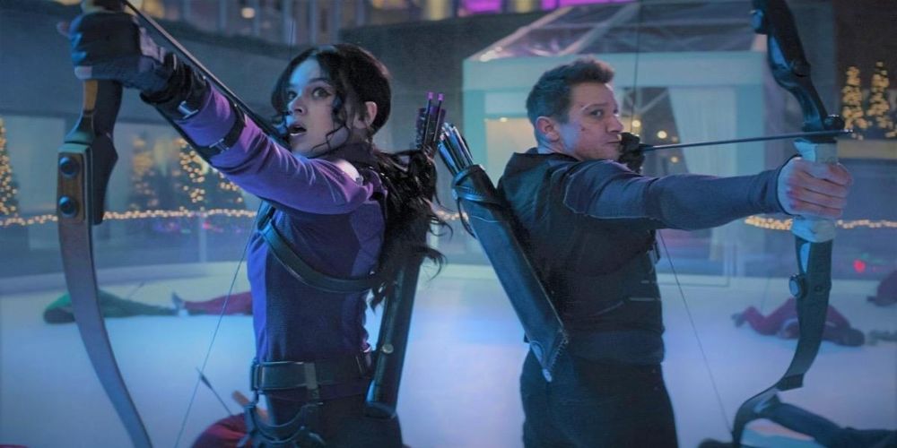 Clint Barton and Kate Bishop fight off the Tracksuit Mafia in Hawkeye using their bows