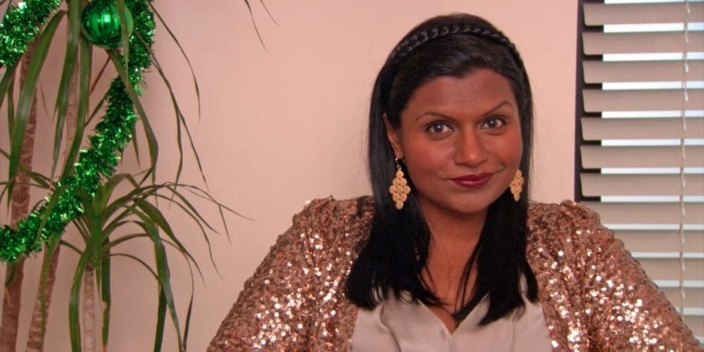 Kelly Kapoor from The Office smiling at the camera