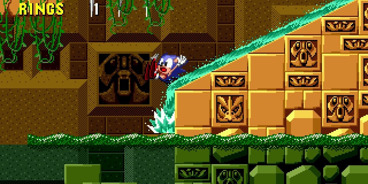 Sonic Sliding Down A Water Fall Into The Water In Labyrinth Zone