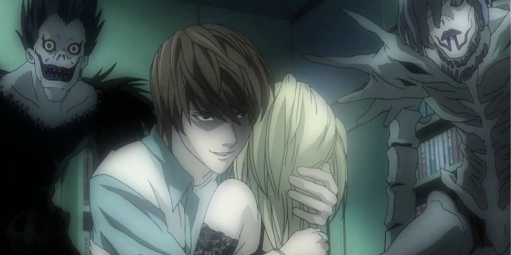 Light with a menacing smile hugging Misa with Ryuk and Rem in background in Death Note