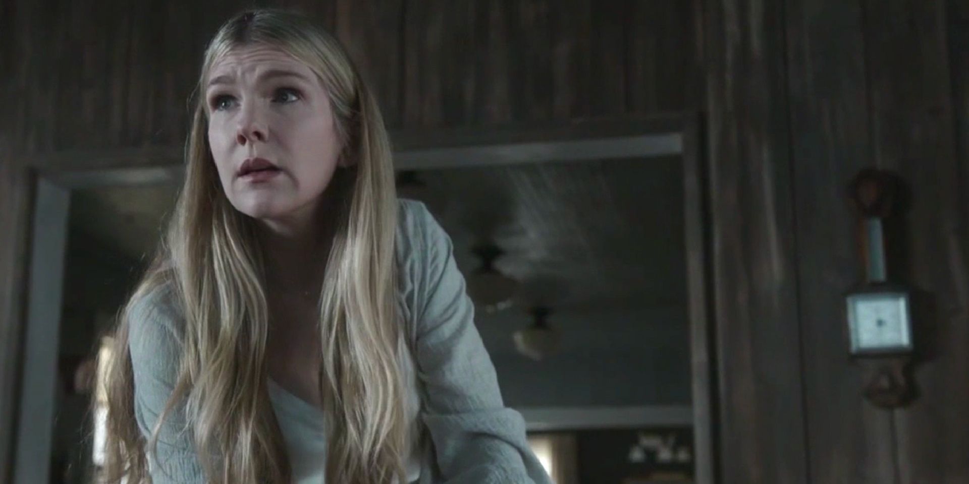 Lily Rabe looks on terrified in American Horror Story