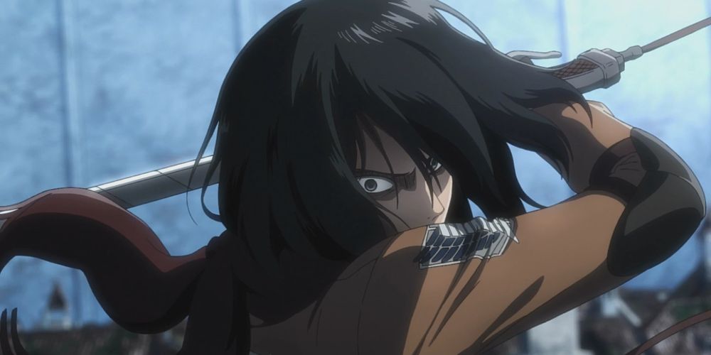 Mikasa attacks Bertholdt.