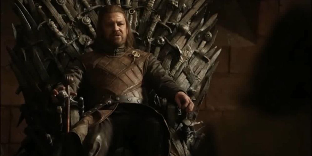 Ned Stark (Sean Bean) sits on the Iron Throne in Game of Thrones