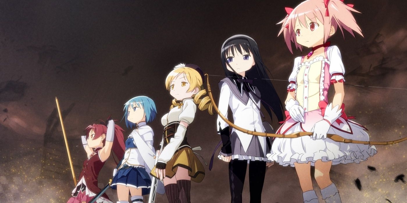 The main cast of the Puella Magi Madoka Magica anime series holding weapons